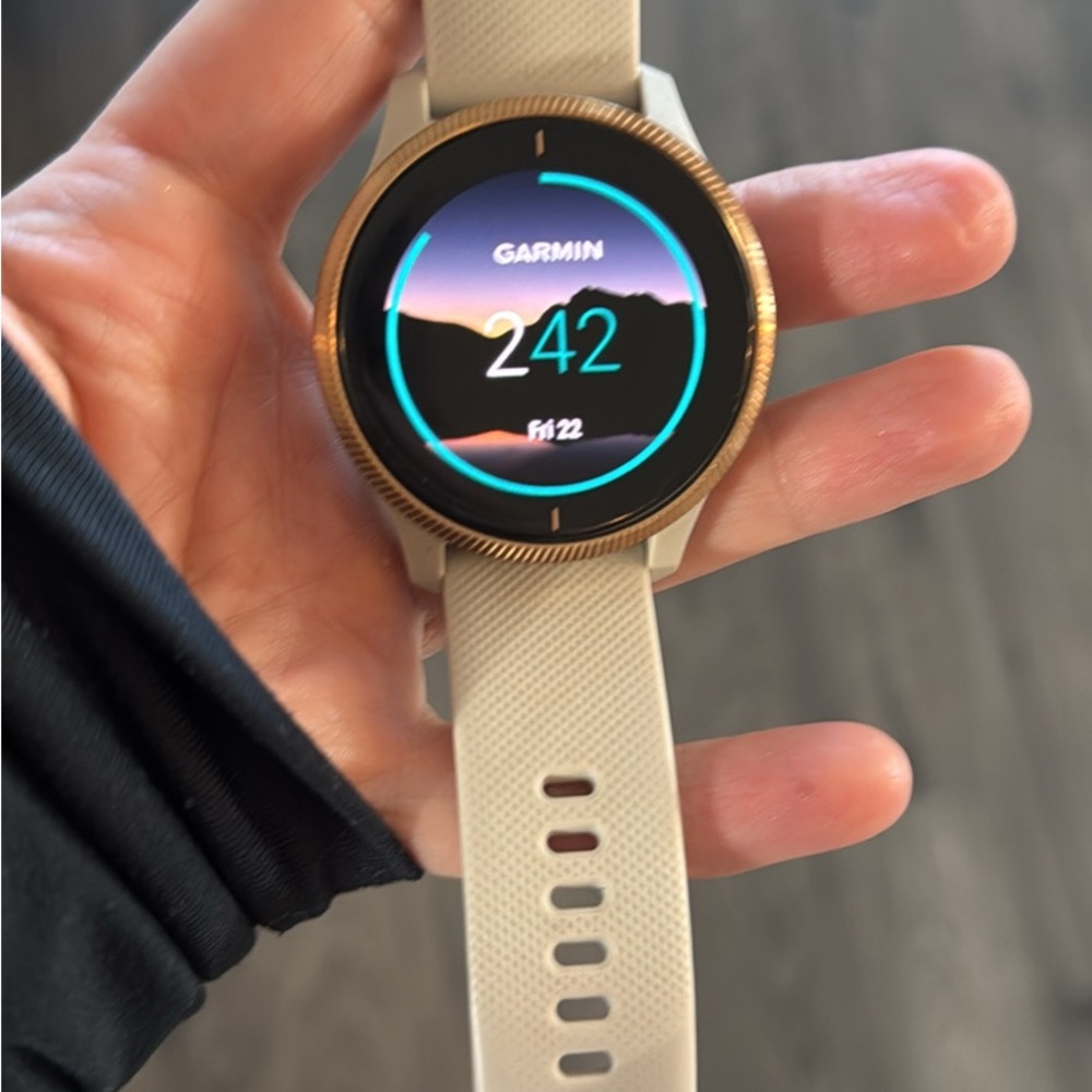 Garmin Cream and Rose Gold Smartwatch with Fitness Tracking and GPS
